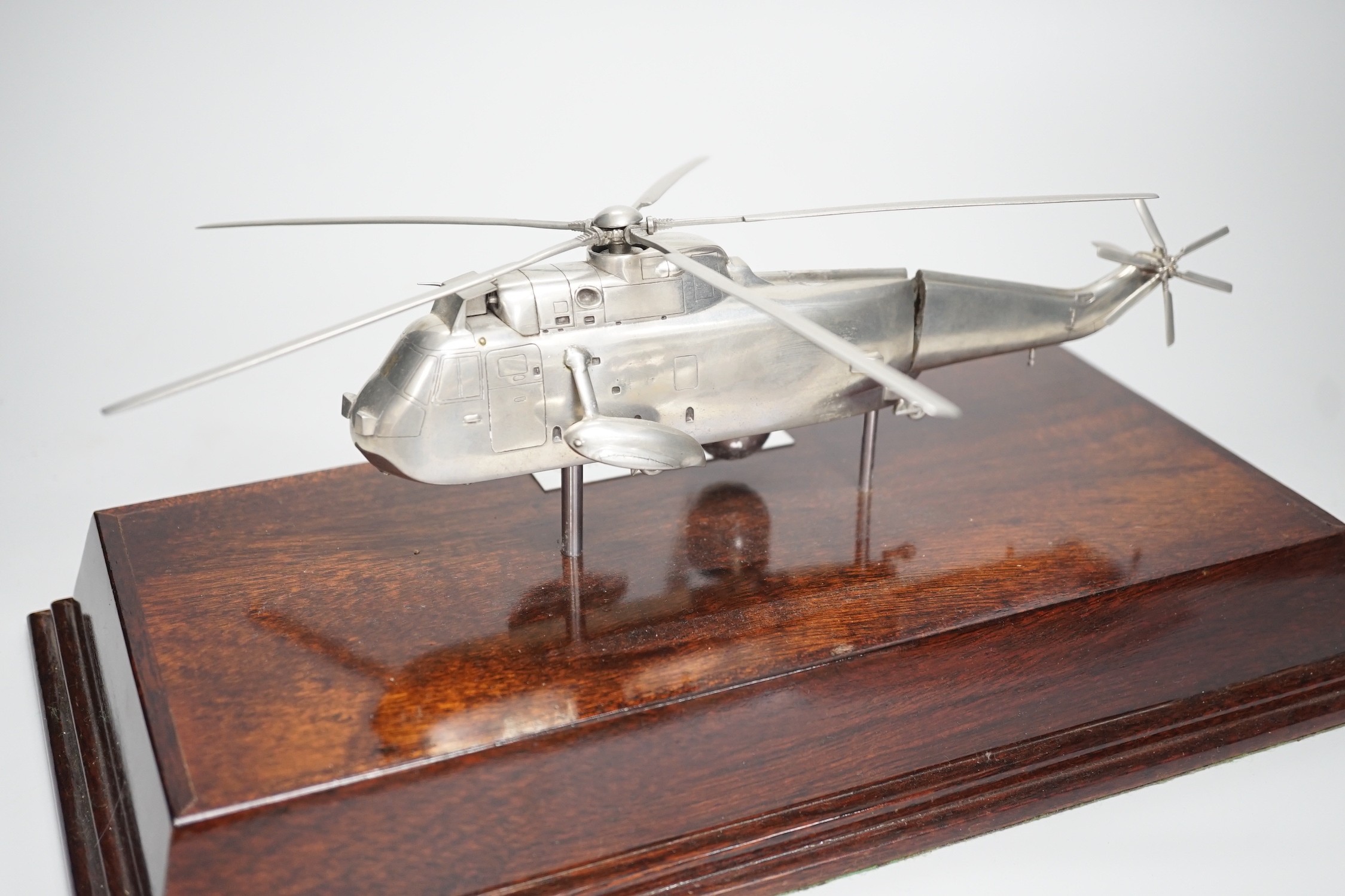 A model of a Sea King helicopter by Brian Banbury, with original case, Helicopter stand 34cm long